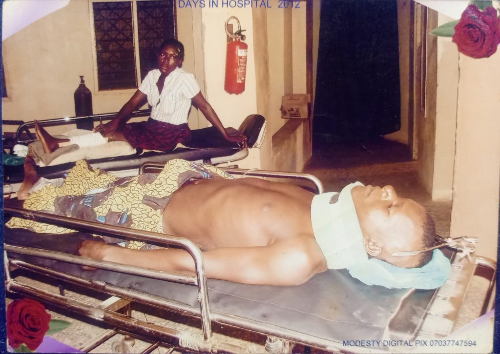Bem Akaanane in the hospital, 2012 — lying in skull traction after a spinal cord injury. This painful beginning became the root of courage and hope.