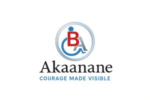 Logo for Akaanane featuring a stylized wheelchair emblem with integrated "B" and "A" letters, a silver circular frame, brand name in bold serif font, and tagline "COURAGE MADE VISIBLE" below.